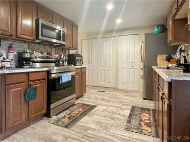 Welcome to this beautifully maintained 2-bedroom, 2-bathroom on Heather Golf and Country Club in Florida - for sale on GolfHomes.com, golf home, golf lot