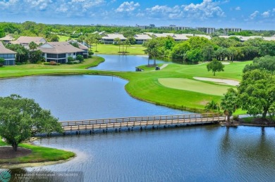Welcome to luxurious living at Fairway Oaks in Boca West. Unit on Boca West Golf and Country Club in Florida - for sale on GolfHomes.com, golf home, golf lot