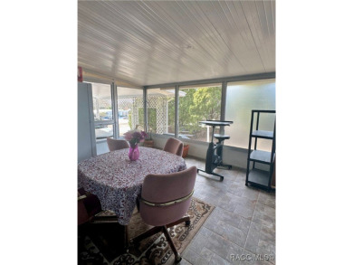Welcome to this beautifully maintained 2-bedroom, 2-bathroom on Heather Golf and Country Club in Florida - for sale on GolfHomes.com, golf home, golf lot