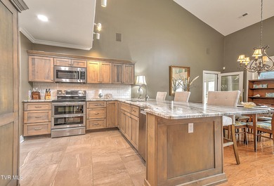 Experience timeless elegance and effortless living in this on Ridges Golf and Country Club in Tennessee - for sale on GolfHomes.com, golf home, golf lot