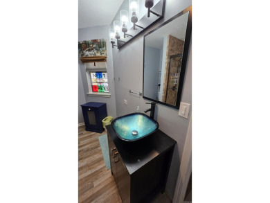 Nicely remodeled condo in Fairfield Bay! Enjoy an open floor on Mountain Ranch Golf Club in Arkansas - for sale on GolfHomes.com, golf home, golf lot