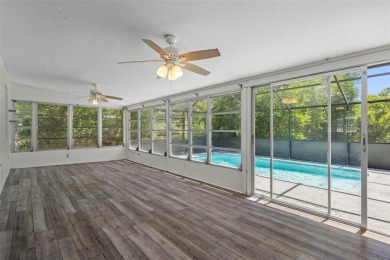 Under contract-accepting backup offers. Welcome to your dream on Oak Hills Country Club in Florida - for sale on GolfHomes.com, golf home, golf lot