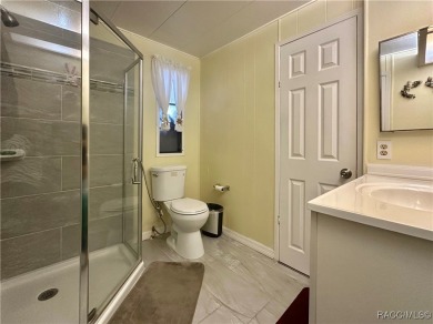 Welcome to this beautifully maintained 2-bedroom, 2-bathroom on Heather Golf and Country Club in Florida - for sale on GolfHomes.com, golf home, golf lot