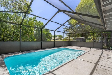 Under contract-accepting backup offers. Welcome to your dream on Oak Hills Country Club in Florida - for sale on GolfHomes.com, golf home, golf lot