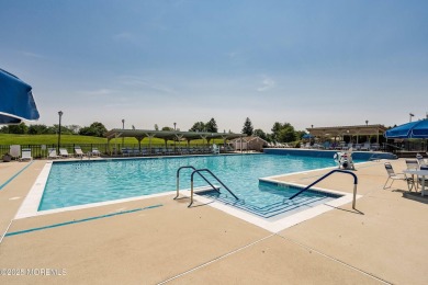 A desirable lower-level Lexington 1 model located on a quiet on Concordia Golf Club in New Jersey - for sale on GolfHomes.com, golf home, golf lot