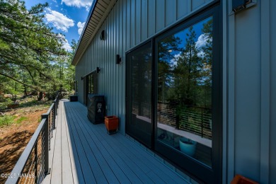 Perched on a serene hillside in Munds Park and bordered by on Pinewood Country Club in Arizona - for sale on GolfHomes.com, golf home, golf lot