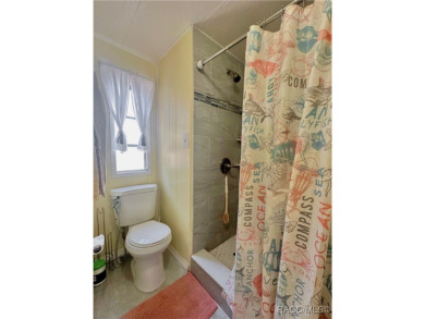 Welcome to this beautifully maintained 2-bedroom, 2-bathroom on Heather Golf and Country Club in Florida - for sale on GolfHomes.com, golf home, golf lot