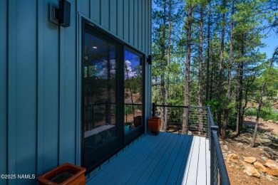Perched on a serene hillside in Munds Park and bordered by on Pinewood Country Club in Arizona - for sale on GolfHomes.com, golf home, golf lot