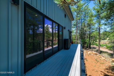 Perched on a serene hillside in Munds Park and bordered by on Pinewood Country Club in Arizona - for sale on GolfHomes.com, golf home, golf lot