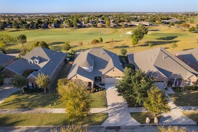 Discover luxurious golf course living in this beautifully on Frisco Lakes Golf Course in Texas - for sale on GolfHomes.com, golf home, golf lot