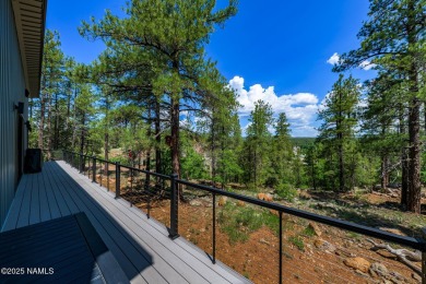 Perched on a serene hillside in Munds Park and bordered by on Pinewood Country Club in Arizona - for sale on GolfHomes.com, golf home, golf lot