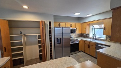 Located in the heart of Fairfield Bay, this well-maintained home on Indian Hills Country Club in Arkansas - for sale on GolfHomes.com, golf home, golf lot