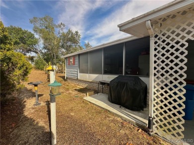 Welcome to this beautifully maintained 2-bedroom, 2-bathroom on Heather Golf and Country Club in Florida - for sale on GolfHomes.com, golf home, golf lot