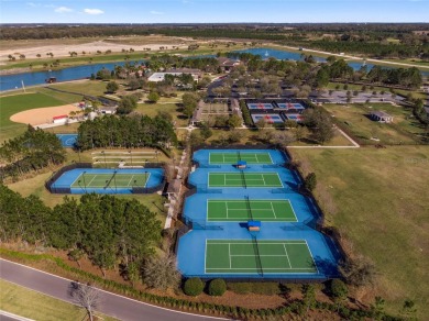 Carefree living awaits in this beautiful Noir Coast model on Stone Creek Golf Club in Florida - for sale on GolfHomes.com, golf home, golf lot