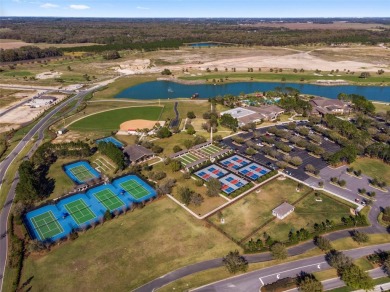 Carefree living awaits in this beautiful Noir Coast model on Stone Creek Golf Club in Florida - for sale on GolfHomes.com, golf home, golf lot