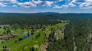 Perched on a serene hillside in Munds Park and bordered by on Pinewood Country Club in Arizona - for sale on GolfHomes.com, golf home, golf lot