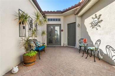 EXPERIENCE TIMELESS SPANISH ELEGANCE IN THIS STUNNING on Hunters Ridge Country Club in Florida - for sale on GolfHomes.com, golf home, golf lot