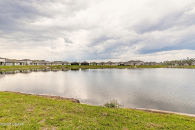 Stunning 4 bedroom, 2 bath lakefront home is nestled in the on LPGA International Golf Course in Florida - for sale on GolfHomes.com, golf home, golf lot