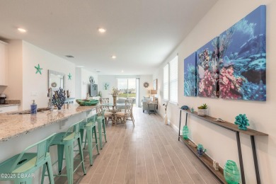Stunning 4 bedroom, 2 bath lakefront home is nestled in the on LPGA International Golf Course in Florida - for sale on GolfHomes.com, golf home, golf lot