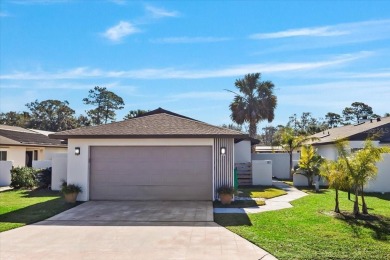 Fully updated 2-bedroom, 2-bath residence on Club House Drive on Palm Harbor Golf Club in Florida - for sale on GolfHomes.com, golf home, golf lot