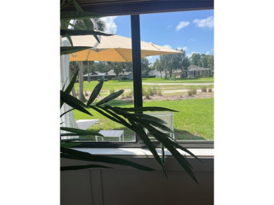 Fully updated 2-bedroom, 2-bath residence on Club House Drive on Palm Harbor Golf Club in Florida - for sale on GolfHomes.com, golf home, golf lot