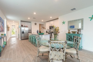 Stunning 4 bedroom, 2 bath lakefront home is nestled in the on LPGA International Golf Course in Florida - for sale on GolfHomes.com, golf home, golf lot