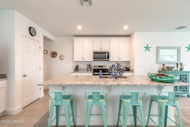 Stunning 4 bedroom, 2 bath lakefront home is nestled in the on LPGA International Golf Course in Florida - for sale on GolfHomes.com, golf home, golf lot