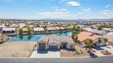 Welcome to your dream home in the prestigious Los Lagos area! on Desert Lakes Golf Course in Arizona - for sale on GolfHomes.com, golf home, golf lot