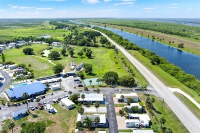 Welcome to Blue Cypress Golf and RV Resort 55+ community with a on Blue Cypress Golf and RV Resort in Florida - for sale on GolfHomes.com, golf home, golf lot