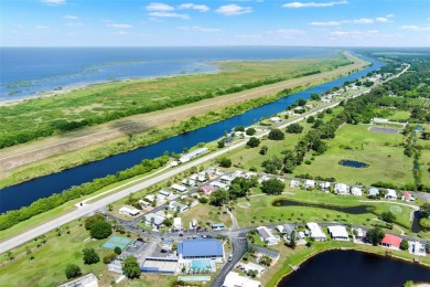 Welcome to Blue Cypress Golf and RV Resort 55+ community with a on Blue Cypress Golf and RV Resort in Florida - for sale on GolfHomes.com, golf home, golf lot