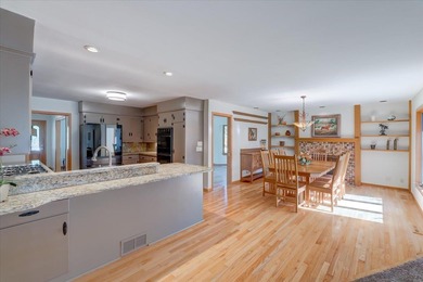 Bright & beautifully maintained this single-story ranch home in on Odana Hills Golf Course in Wisconsin - for sale on GolfHomes.com, golf home, golf lot