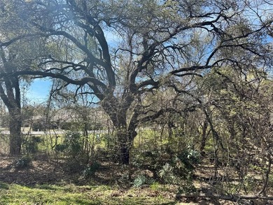 This buildable lot is located in the highly sought-after on De Cordova Bend Country Club in Texas - for sale on GolfHomes.com, golf home, golf lot