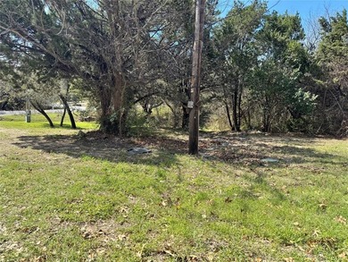 This buildable lot is located in the highly sought-after on De Cordova Bend Country Club in Texas - for sale on GolfHomes.com, golf home, golf lot