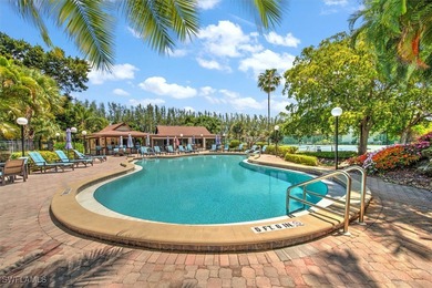 Live the quintessential Naples lifestyle in this beautifully on Quail Run Golf Club In Naples in Florida - for sale on GolfHomes.com, golf home, golf lot