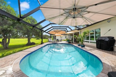 Welcome to this beautifully upgraded residence located in the on Woodlands Country Club in Florida - for sale on GolfHomes.com, golf home, golf lot