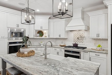 Southern Charm at its finest! This elegant 4 bedroom, 3.5 on Hampton Hall Club in South Carolina - for sale on GolfHomes.com, golf home, golf lot
