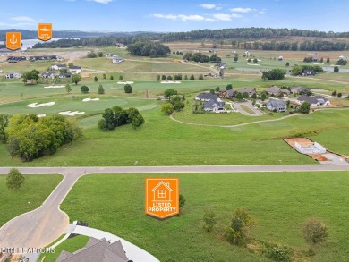 This half acre lot offers views of TN Nationals 13th and 14th on Tennessee National Golf Club in Tennessee - for sale on GolfHomes.com, golf home, golf lot