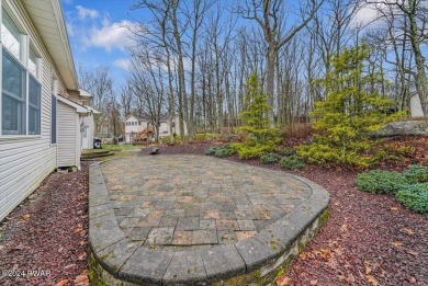 Introducing a stunning corner-lot brick house in the highly on Woodloch Pines Resort in Pennsylvania - for sale on GolfHomes.com, golf home, golf lot
