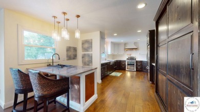This expansive two-story residence, located in the desirable on Sedalia Country Club in Missouri - for sale on GolfHomes.com, golf home, golf lot
