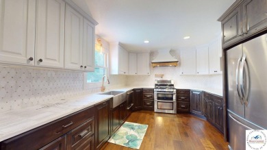 This expansive two-story residence, located in the desirable on Sedalia Country Club in Missouri - for sale on GolfHomes.com, golf home, golf lot
