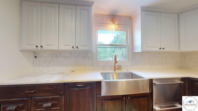 This expansive two-story residence, located in the desirable on Sedalia Country Club in Missouri - for sale on GolfHomes.com, golf home, golf lot