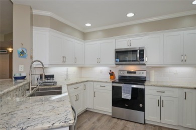Stunning 1st floor end unit carriage home in Lexington Country on Lexington Country Club in Florida - for sale on GolfHomes.com, golf home, golf lot