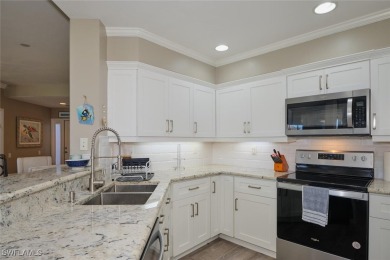 Stunning 1st floor end unit carriage home in Lexington Country on Lexington Country Club in Florida - for sale on GolfHomes.com, golf home, golf lot