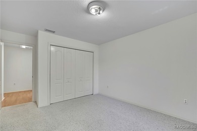 Welcome to this light and bright 3-bedroom, 2-bath home situated on Sugarmill Woods Golf and Country Club in Florida - for sale on GolfHomes.com, golf home, golf lot