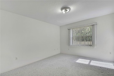 Welcome to this light and bright 3-bedroom, 2-bath home situated on Sugarmill Woods Golf and Country Club in Florida - for sale on GolfHomes.com, golf home, golf lot