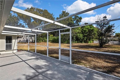 Welcome to this light and bright 3-bedroom, 2-bath home situated on Sugarmill Woods Golf and Country Club in Florida - for sale on GolfHomes.com, golf home, golf lot