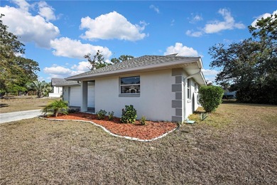 Welcome to this light and bright 3-bedroom, 2-bath home situated on Sugarmill Woods Golf and Country Club in Florida - for sale on GolfHomes.com, golf home, golf lot