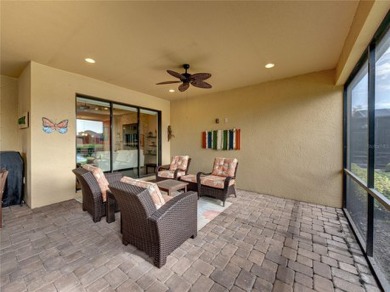 Stunning 3BR/3BA home on a pond located in the gated Esplanade on Esplanade Golf and Country at Lakewood Ranch in Florida - for sale on GolfHomes.com, golf home, golf lot