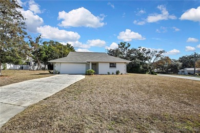 Welcome to this light and bright 3-bedroom, 2-bath home situated on Sugarmill Woods Golf and Country Club in Florida - for sale on GolfHomes.com, golf home, golf lot