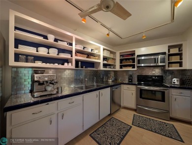 Beautifully updated and furnished, large 2 bedroom condominium on Palm-Aire Country Club and Resort - The Oaks in Florida - for sale on GolfHomes.com, golf home, golf lot